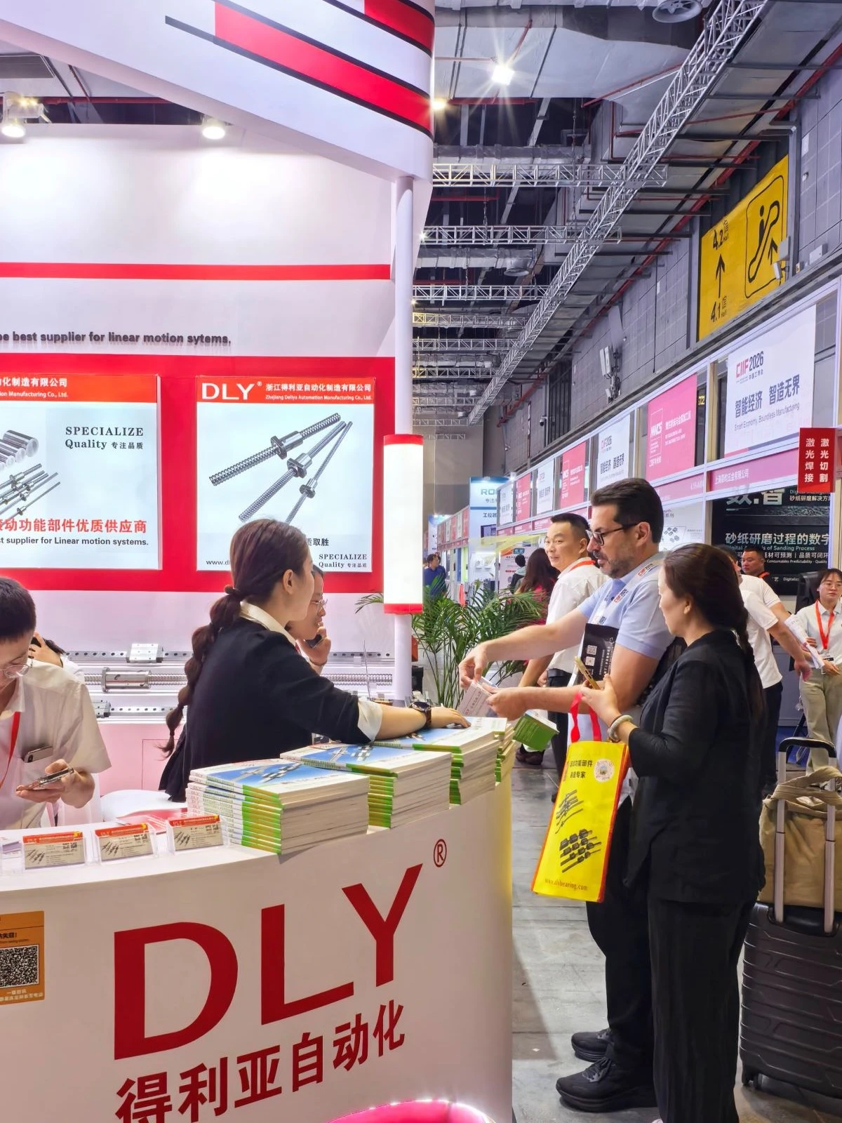 Customer discussing linear guideway requirements with a DLY representative Customer discussing linear guideway requirements with a DLY representative