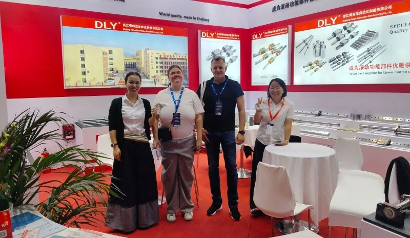 DLY team taking a group photo with overseas customers at CIIF 2026 DLY team taking a group photo with overseas customers at CIIF 2026